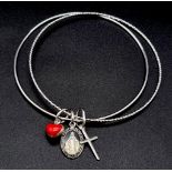A sterling silver double bangle with three charms. weight: 9.2 g.
