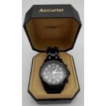 An Accurist 100M Chronograph Gents Watch. Black metal strap and case - 45mm. Black dial with three