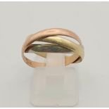 A 9 K three coloured gold, three band ring of Russian origin. Size: P, weight: 3 g.