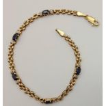 9k yellow gold diamond and sapphire bracelet. 19cm in length, 4.4 grams total weight