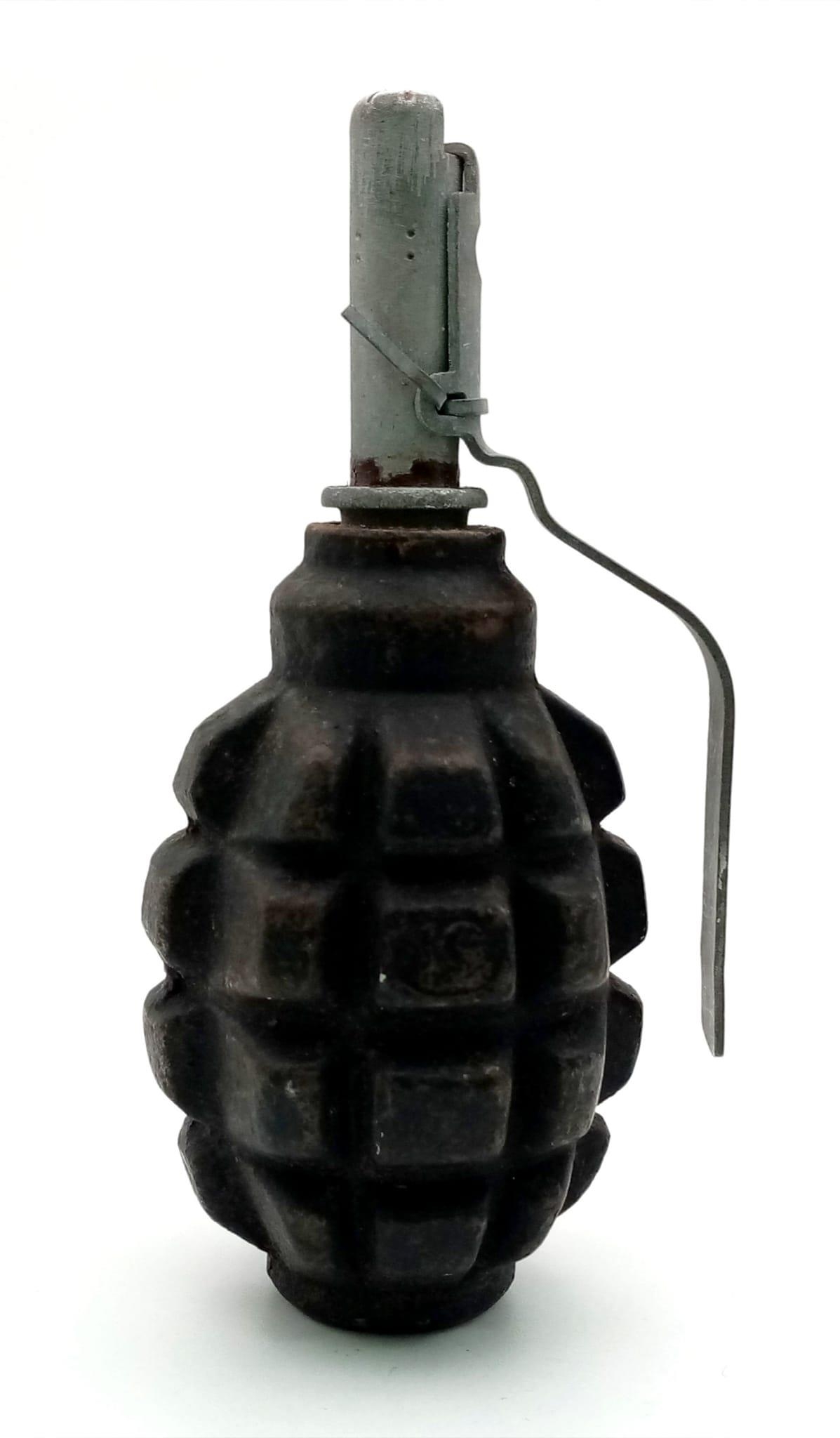 A WW2 Pattern F-1 Deactivated Pineapple Grenade in good condition.