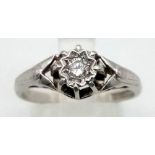 A vintage 18 K white gold and platinum diamond (0.10 carats) solitaire ring. Size: Q, weight: 4.2 g.