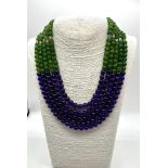 A Five-Strand Jade and Amethyst Beaded Necklace. 7mm beads. Fancy antique style rondelle spacers and