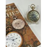 Vintage pocket watch with Chinese symbolism and book , works if winder pressed down to wind