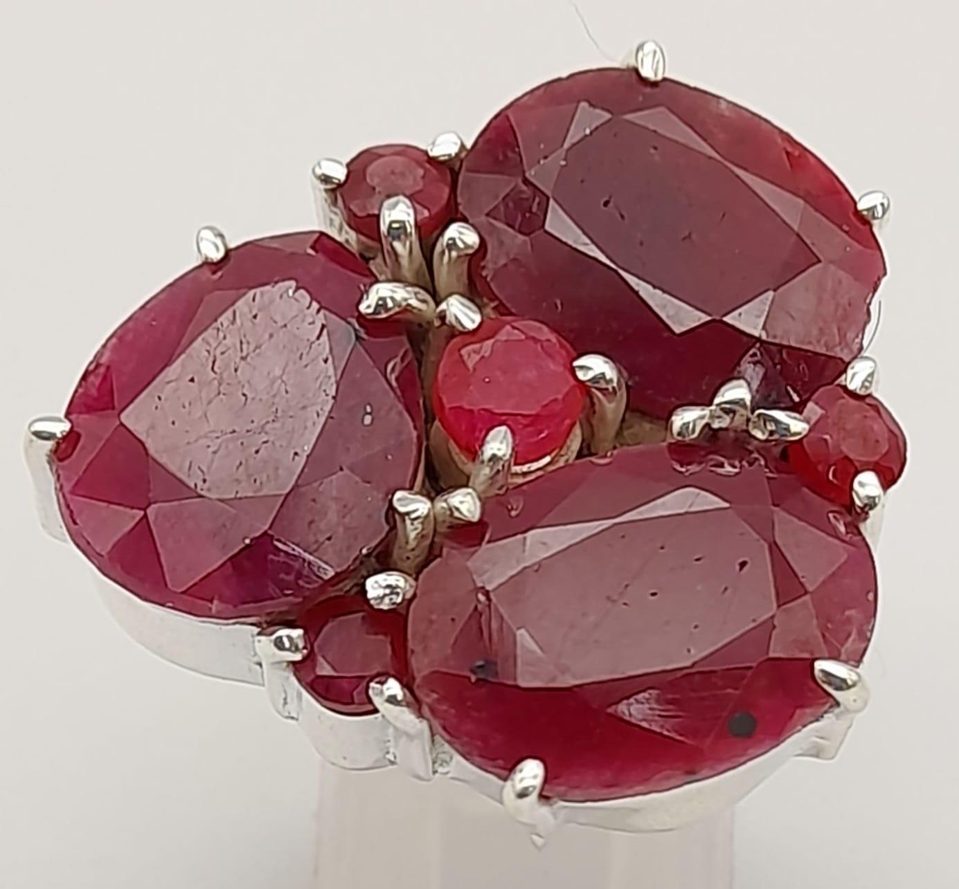 A Ruby Gemstone Cocktail Ring in 925 Silver. Size O. 15g total weight.