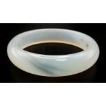 A Translucent White Jade Bangle. 6cm inner diameter.