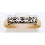 AN 18K GOLD 4 DIAMOND RING. 2.8gms size K/L