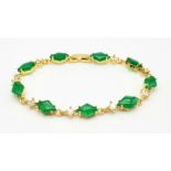 A Green and White Stone Bracelet on Gilded Metal. 19cm
