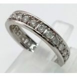 An 18 K white gold full eternity ring, diamonds 0.50 carats, ring size: J, weight: 3.1 g.