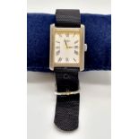 A Vintage Rotary 925 Silver Tank Watch. Black cloth strap. Square silver case - 32 x 25mm. White