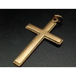A 9 K yellow gold cross. Height: 28 mm, weight: 1.1 g.