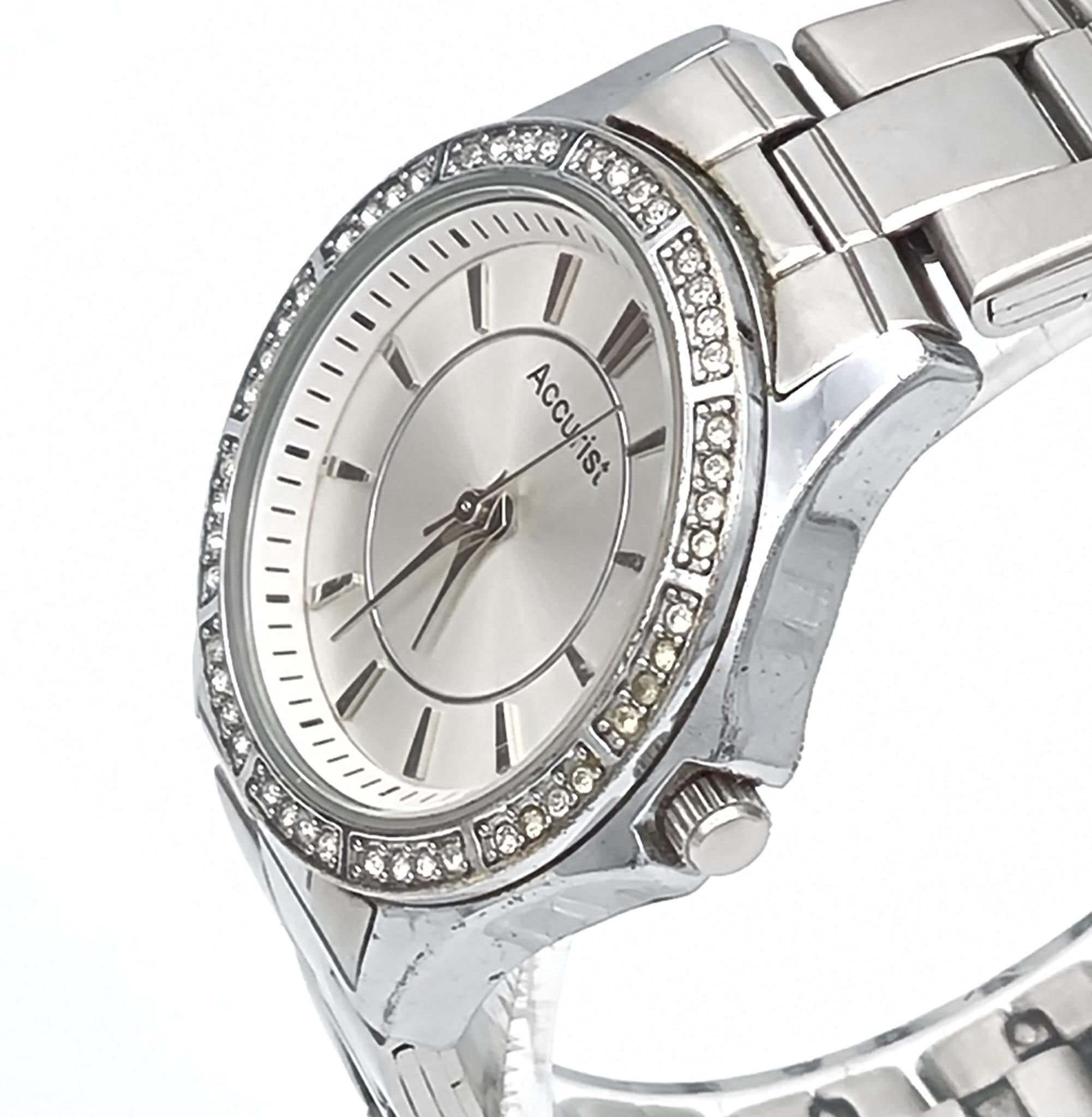 A Quality Accurist Ladies Diamonte Watch. Stainless steel strap and case - 28mm. Silver tone dial. - Image 3 of 10