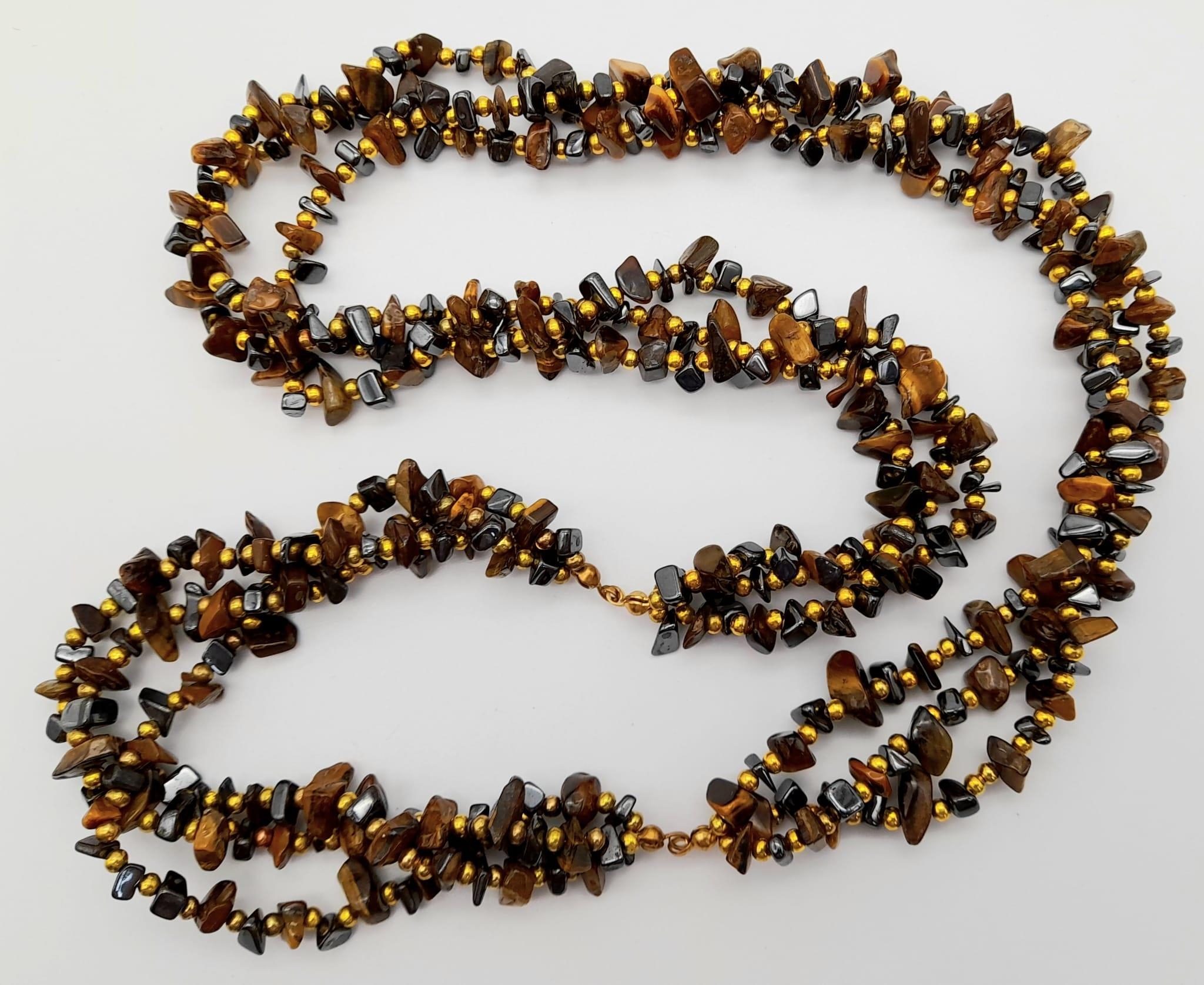 A Three Strand Rough Tigers Eye Bead Necklace. 60cm. - Image 2 of 4