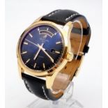 A Breitling Transocean Automatic Rose Gold Cased Gents Watch. Black leather strap. Rose gold