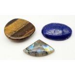 Lot of 3 Gemstones - 37.89 Ct Cabochon Lapis Lazuli, 47.51 Ct Cabochon Tiger Eye & 19.24 Ct Cabochon