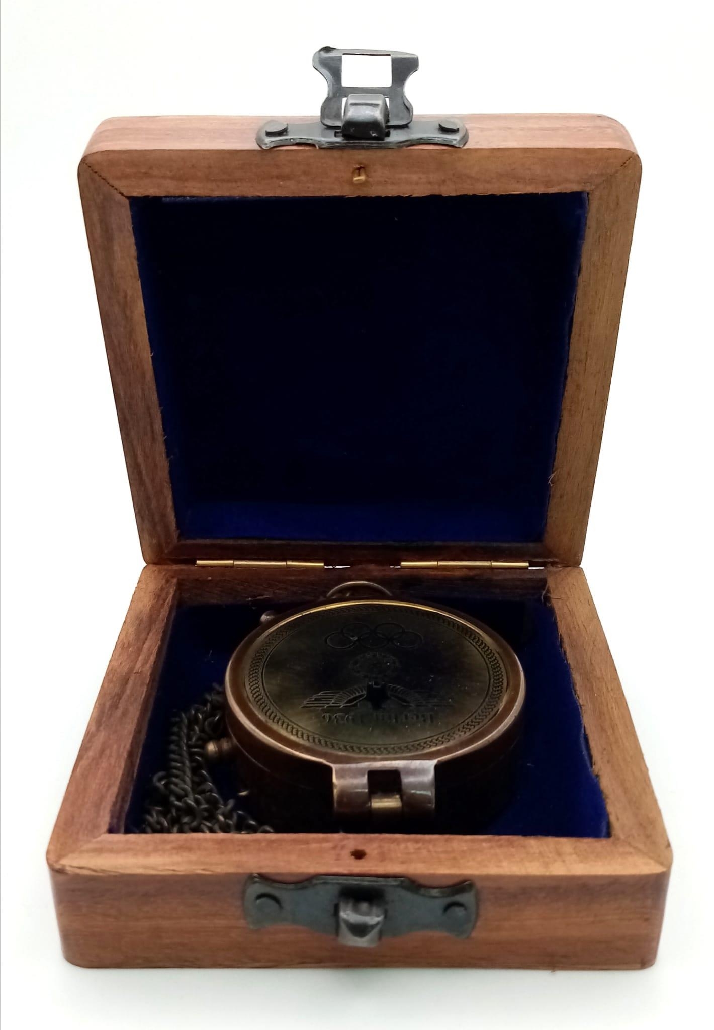 A brass compass with immobiliser, brass chain and inscription BERLIN 1936 in a wooden box with - Image 5 of 6