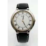 A Seiko Quartz Unisex Watch. Black leather strap. Case -32mm. White dial. In good condition and