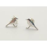 A sterling silver ALEX MONROE pair of Robin stud earrings. Weight: 1.1 g