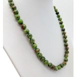 A Ruby Zoisite Bead Necklace. 8mm beads. 42cm