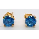 A Pair of Blue Topaz Gold Plated Stud earrings.