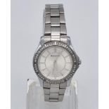 A Quality Accurist Ladies Diamonte Watch. Stainless steel strap and case - 28mm. Silver tone dial.