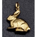 A 9 K yellow gold rabbit charm. weight: 0.7 g.
