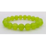 Expandable Lime-Green Jade Bead Bracelet. 10mm beads.