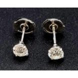 18ct white gold diamond stud earrings. Round brilliant cut, 1ct diamond total, colour H-I, SI1-SI2.