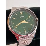 Gentlemans LORUS Quartz wristwatch in silver tone having attractive oversize large green face with