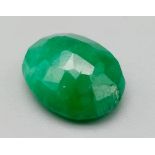 A 8.20ct Green Beryl (Composite). Oval cut. Comes with a certificate.