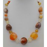 A Multi-Coloured Agate Smooth and Rough Bead Necklace. 38cm.