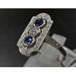 A 950 Platinum Sapphire and Diamond W.G.I Certified Art Deco Ring. A platinum ring with 31 round