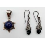 A sterling silver lapis lazuli pendant AND a sterling silver black onyx Celtic drop pair of
