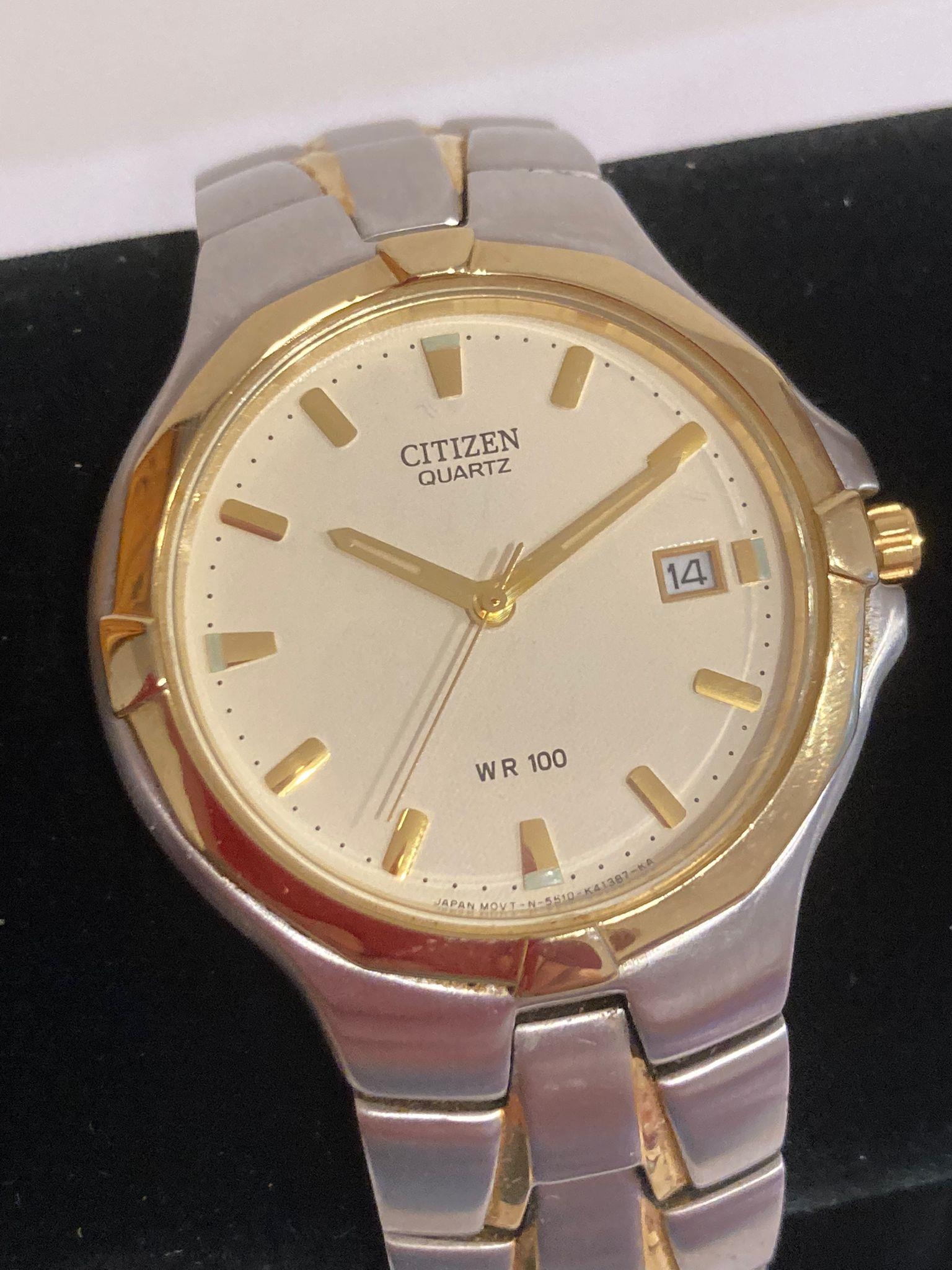 CITIZEN QUARTZ WRISTWATCH 5510 in two tone stainless steel with gold tone detail. Water resistant to