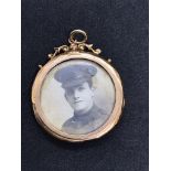 Victorian solid 9ct yellow gold locket pendant with original loop having photo of a Military officer