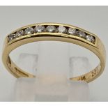 An 18 K yellow gold half eternity diamond (0.25 carats) ring. Size: O, weight: 2.1 g.