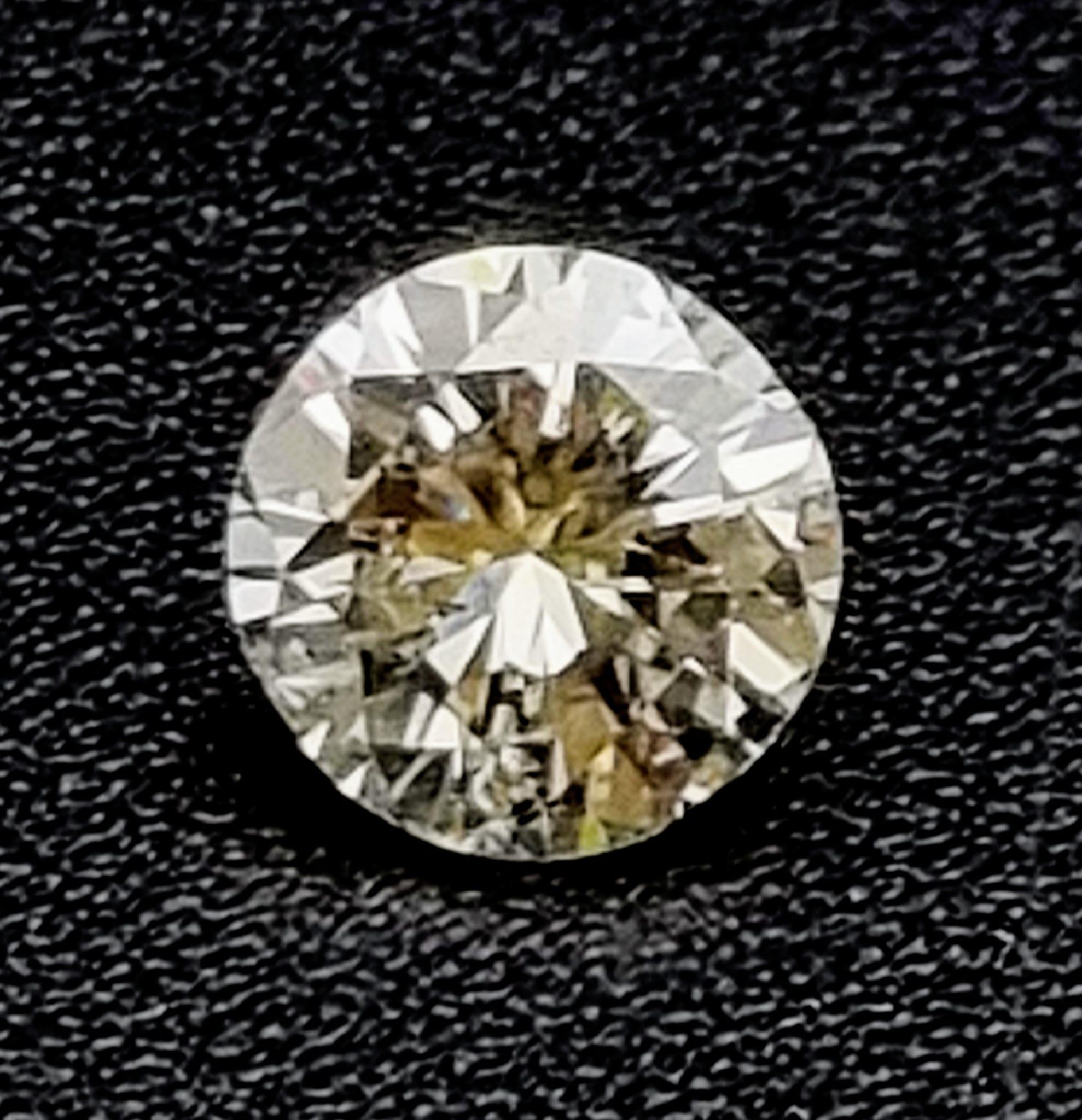 A BRILLIANT CUT QUALITY DIAMOND SINGLE STONE .86CT