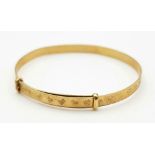 A 9 K yellow gold baby bangle, weight: 1.6 g.