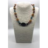 An Unusual Multi-Coloured Lava Stone Necklace. 46cm