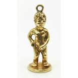 18k Yellow Gold Peeing Boy Charm. 19mm in length, 2.5 grams total weight