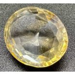 A 18.95ct Bi-coloured Citrine Quartz Oval cut. Comes with a certificate.