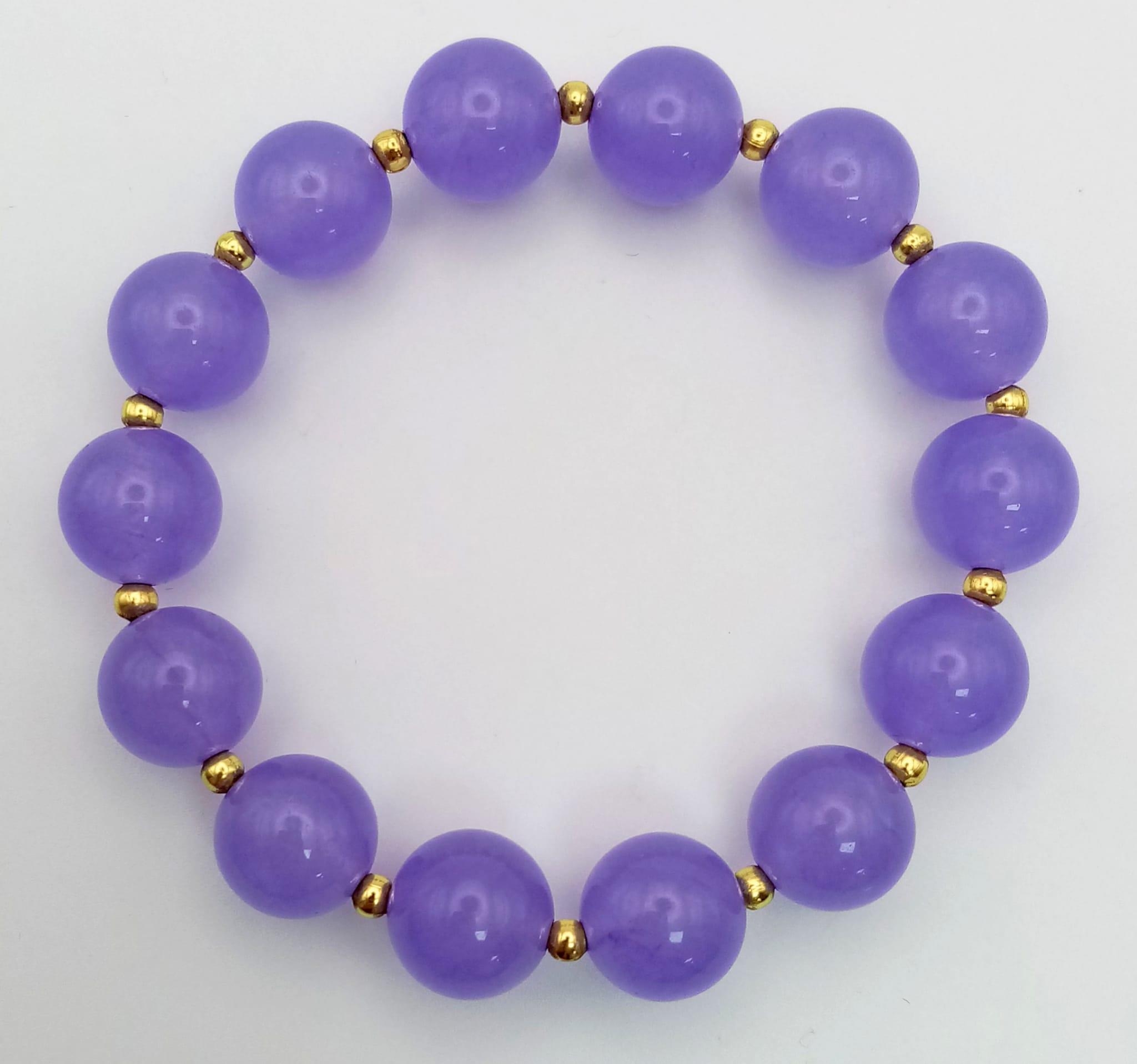 A Purple Jade Bead Expandable Bracelet. - Image 2 of 3