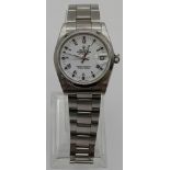 THE MID SIZE ROLEX OYSTER PERPETUAL DATEJUST IN STAINLESS STEEL WITH WHITE FACE AND ROMAN NUMERALS ,