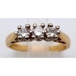 AN 18K GOLD DIAMOND TRILOGY RING.3.5gms size L 0.50CT DIAMONDS