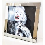 A Tattooed Body Black and White Picture of a Smiling Marilyn Monroe. In chrome effect frame - 85 x
