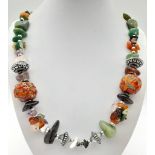 A Multi-Coloured Gemstone Rough Beaded Necklace. 54cm