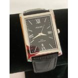 Gentlemans PULSAR VX32 Quartz Silver Tone wristwatch.Having large square black face with Roman