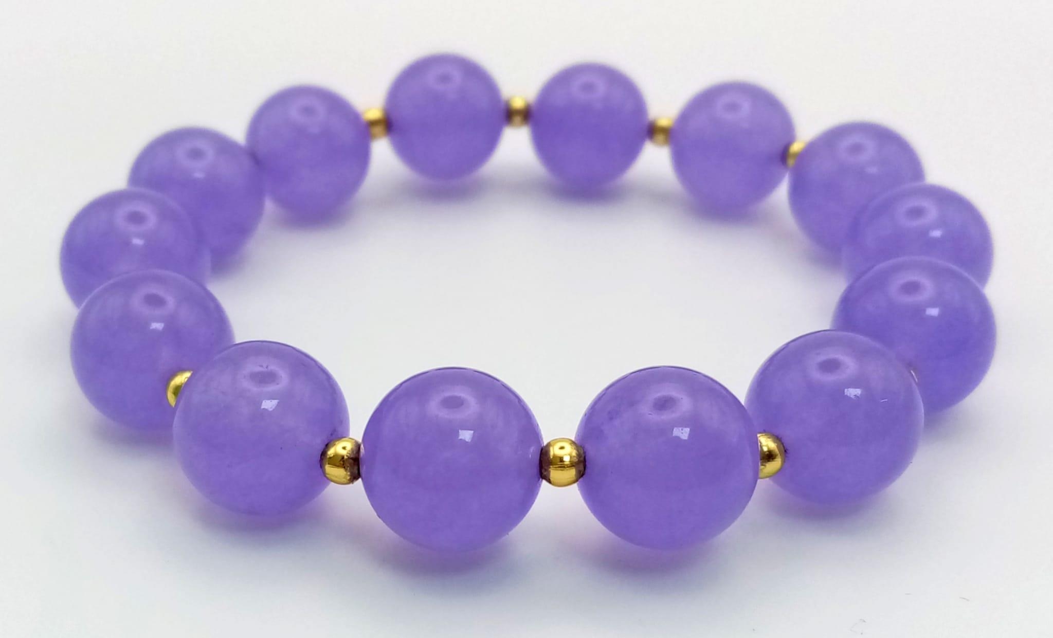 A Purple Jade Bead Expandable Bracelet.