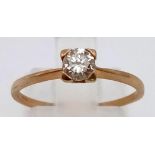 An 18K Yellow Gold Diamond Solitaire Ring. 0.2ct. Size N. 1.17g total weight.