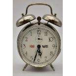 A Vintage Backwards Double-Bell Alarm Clock. In working order.